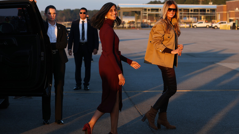Usha Vance and Melania Trump prepare to board a plane to return to Washington, DC november 2025