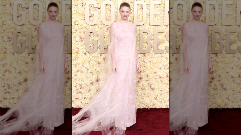 Hunter Shafer posing in a gauzy gown at the Golden Globes