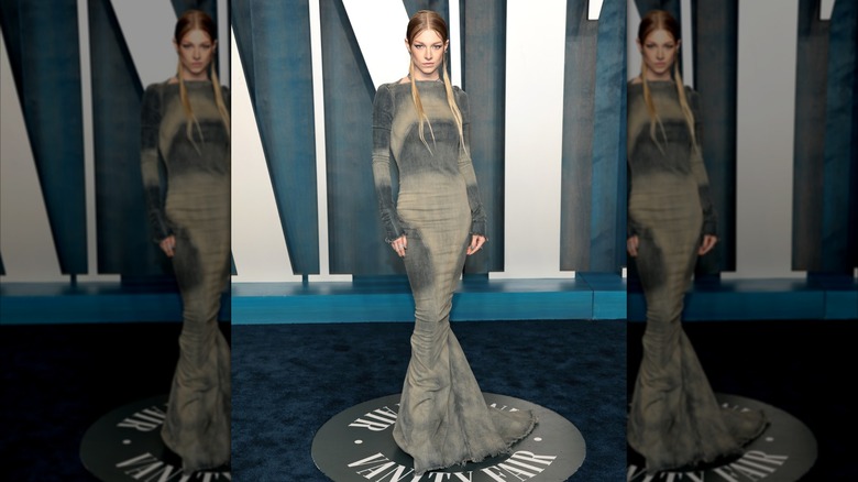 Hunter Schafer looking fierce at the 2022 Vanity Fair Oscars Party