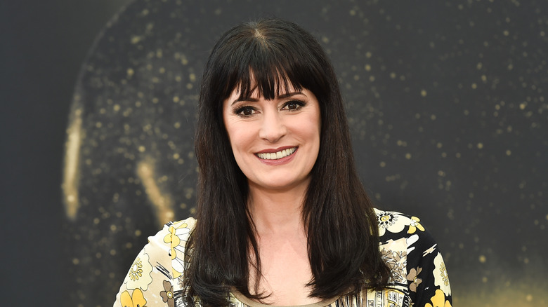 Paget Brewster smiles on the red carpet in 2017