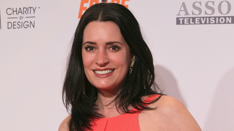 Paget Brewster smiles on the red carpet in 2016