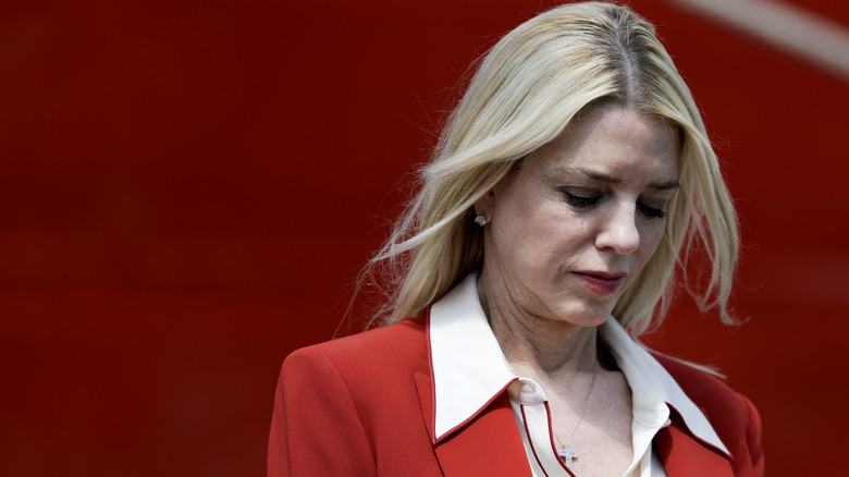 Pam Bondi in a red suit