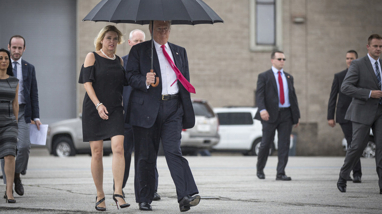 Donald Trump and Pam Bondi walking