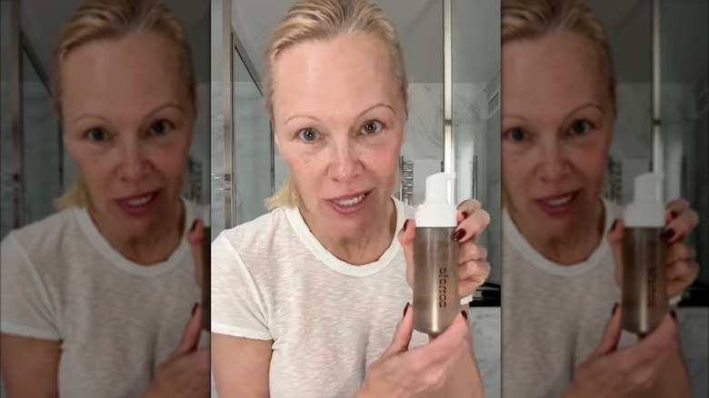 Pamela Anderson on Instagram holding a face wash in her bathroom
