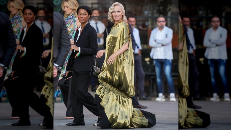 Pamela Anderson in a gold dress in Milan in 2026
