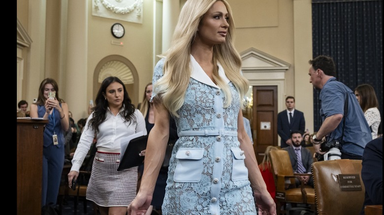 Paris Hilton in a blue floral dress in congress
