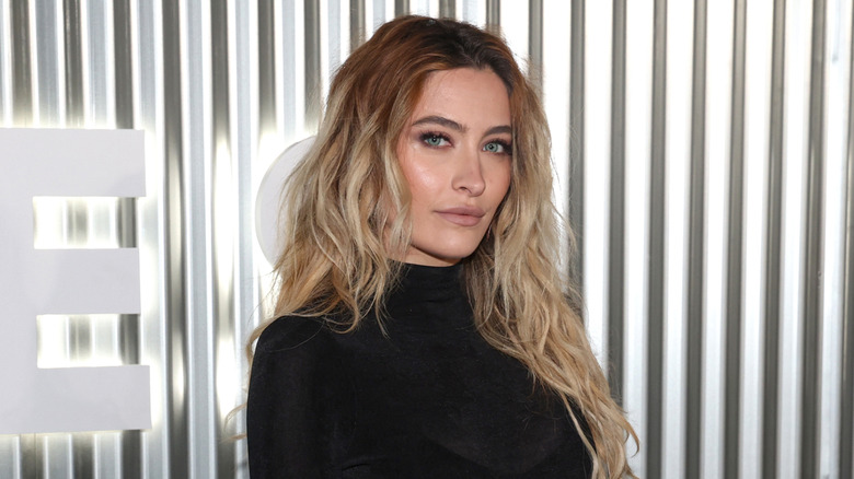 Paris Jackson posing at event