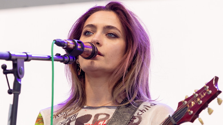 Paris Jackson at Bonnaroo with purple hair in 2023