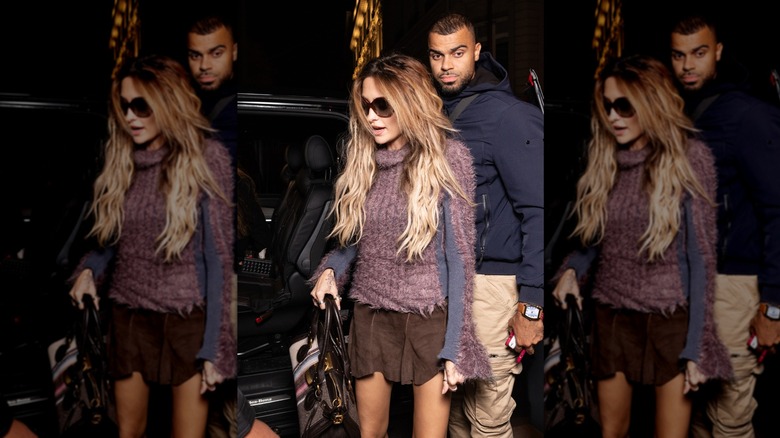Paris Jackson walking with sunglasses and long balayage hair