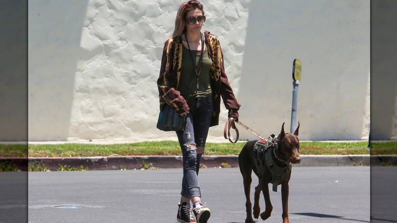 Paris Jackson walking her dog