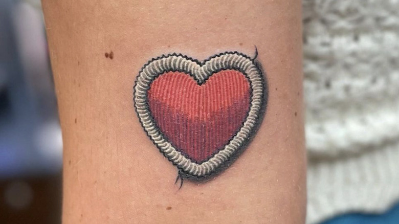 Heart patch tattoo