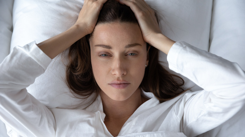 Woman can't sleep in bed
