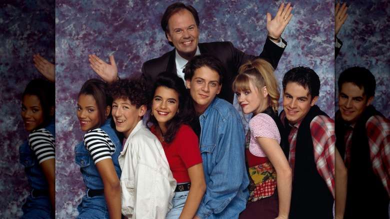 Pictured (L-R): Bianca Lawson as Megan Jones, Isaac Lidsky as Barton 'Weasel' Wyzell, Natalia Cigliuti as Lindsay Warner, Robert Sutherland Telfer as Scott Erickson, Bonnie Russavage as Vicki Needleman, Jonathan Angel as Tommy 'D' De Luca; (Back) Dennis Haskins as Principal Richard Belding