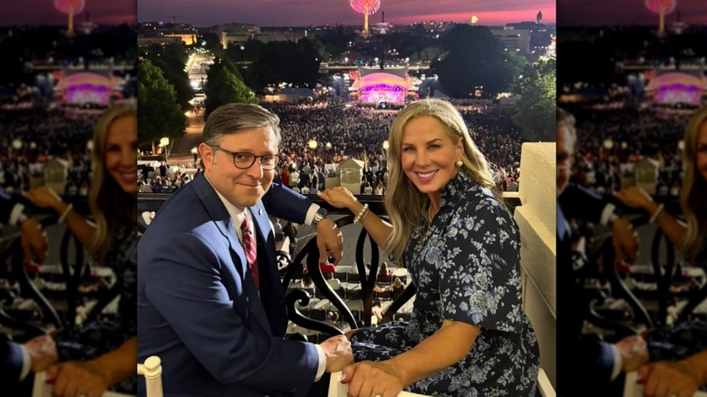 Kelly and Mike Johnson smiling in July, 2025