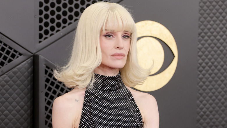 Kelly Osbourne poses with blonde bob