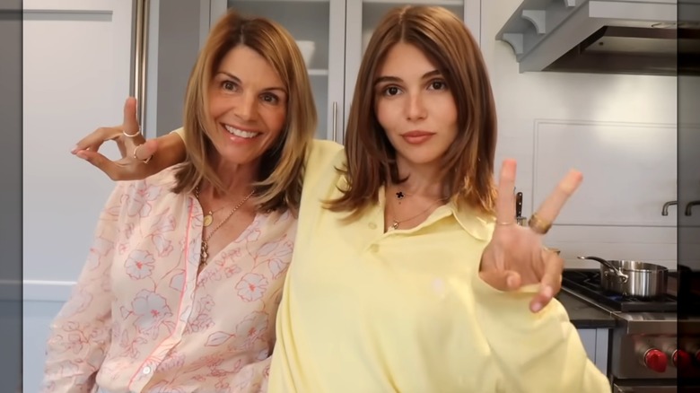 Lori Loughlin and Olivia Jade Giannulli posing in the kitchen