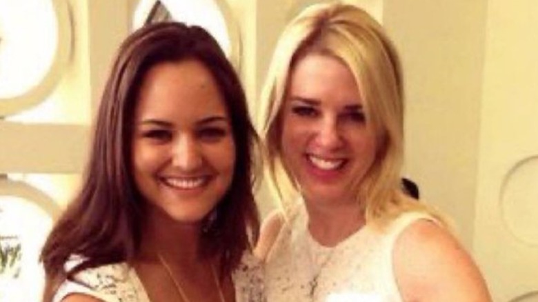 Pom Bondi with a fan