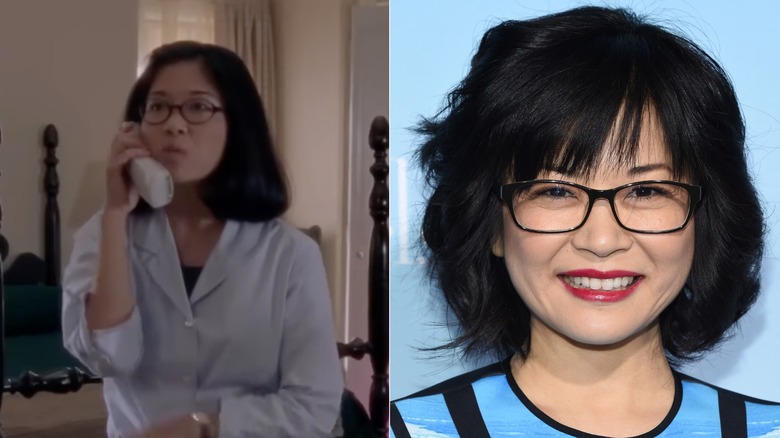 Keiko Agena holds a phone on the set of Gilmore Girls. Keiko Agena smiles with red lipstick in 2026.