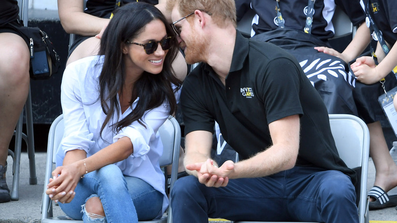 Prince Harry and Meghan Markle smiling