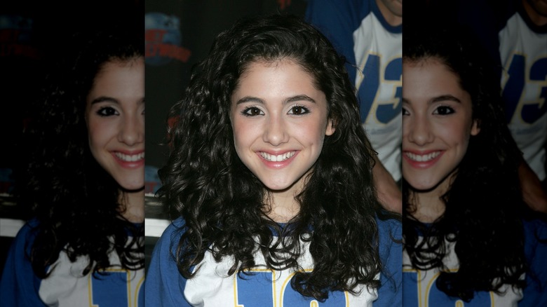 Ariana Grande with dark, curly hair