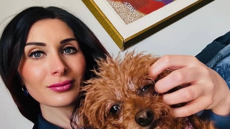 Laura Loomer with her dog
