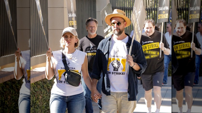 Noah and Sara Wyle on the SAG-AFTRA strike picket line