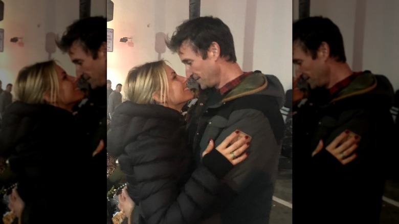 Noah and Sara Wyle embracing