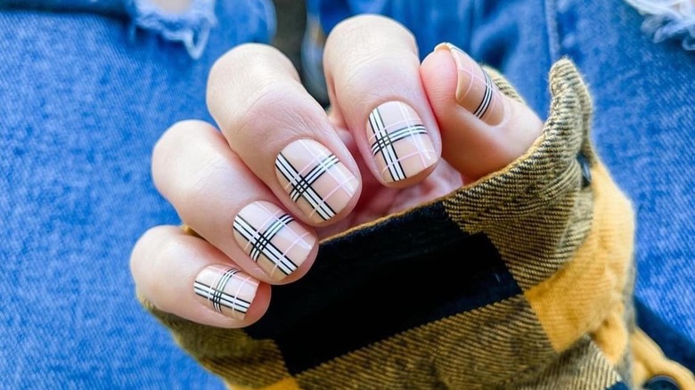 black, white, and cream plaid nails