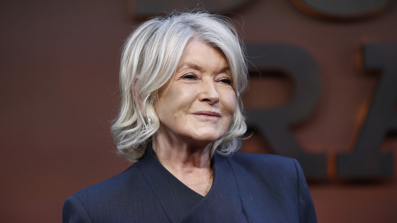 Martha Stewart on the red carpet in a blue jacket