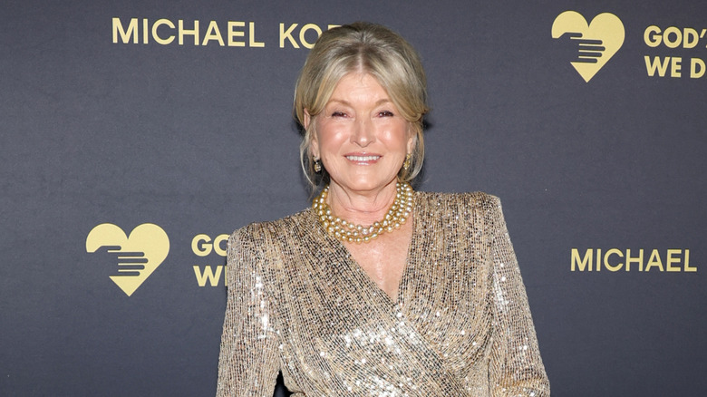 Martha Stewart on the red carpet in a glittering gold shirt