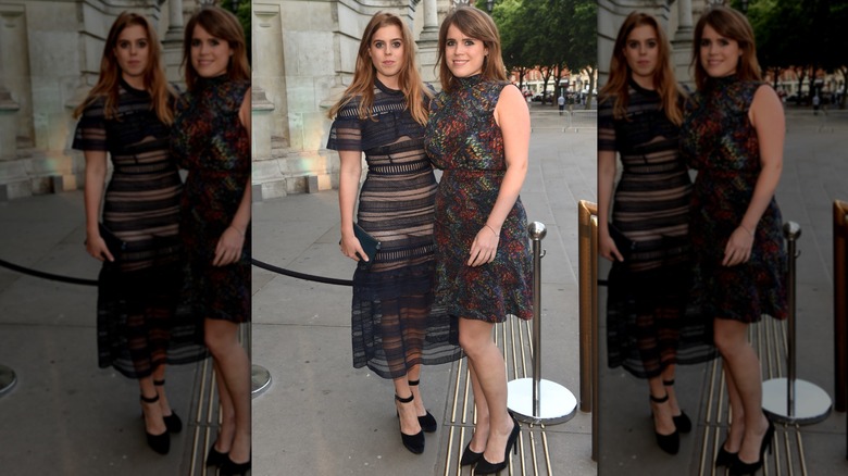 Princesses Beatrice and Eugenie outside at an event