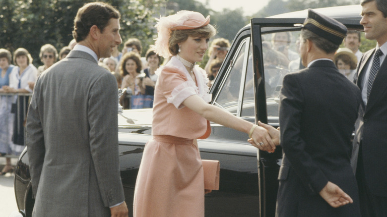 Princess Diana shaking hands with a driver at Romsey Station heading off to her honeymoon in 1981