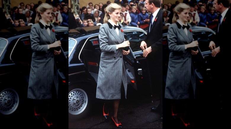Princess Diana stepping out of a car while wearing a long, gray coat and black-and-white heels