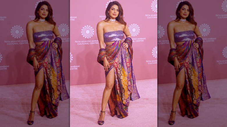 Priyanka Chopra posing in a colorful dress at a 2023 event