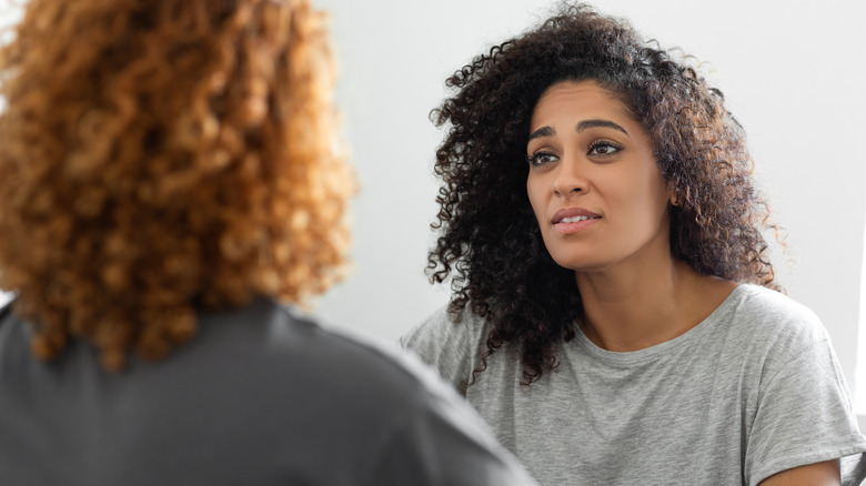 Two women talking