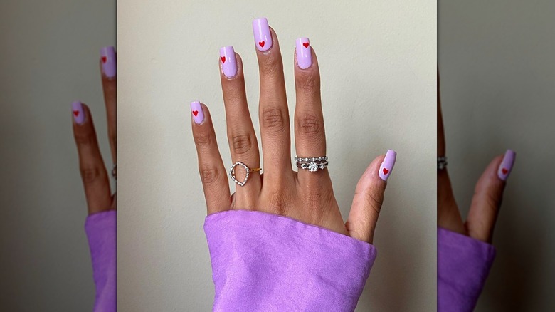 Lilac nails red hearts