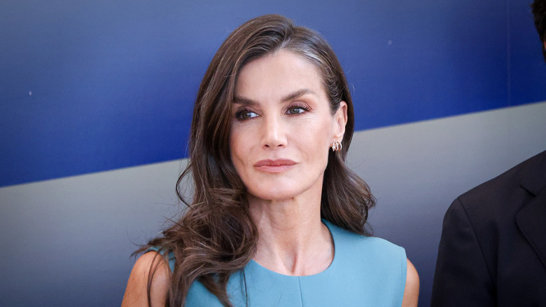 Queen Letizia smiling at an event in 2026