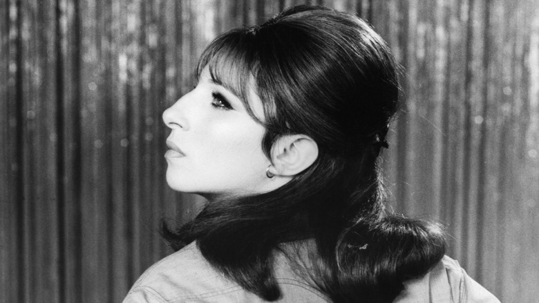 Black-and-white photo of Barbra Streisand in "Funny Girl," looking to the side for a profile view
