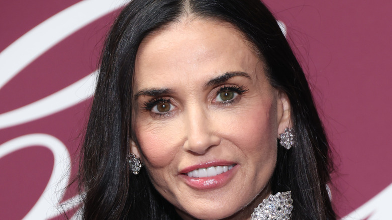 Demi Moore smiles on the red carpet in 2026