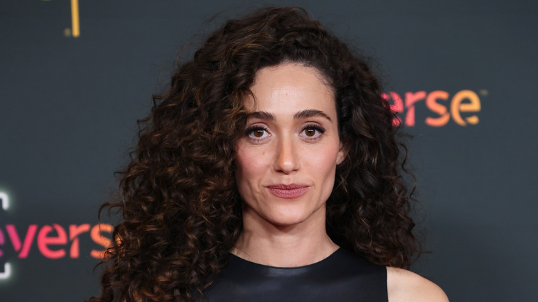 Emmy Rossum smiles on the red carpet in 2026