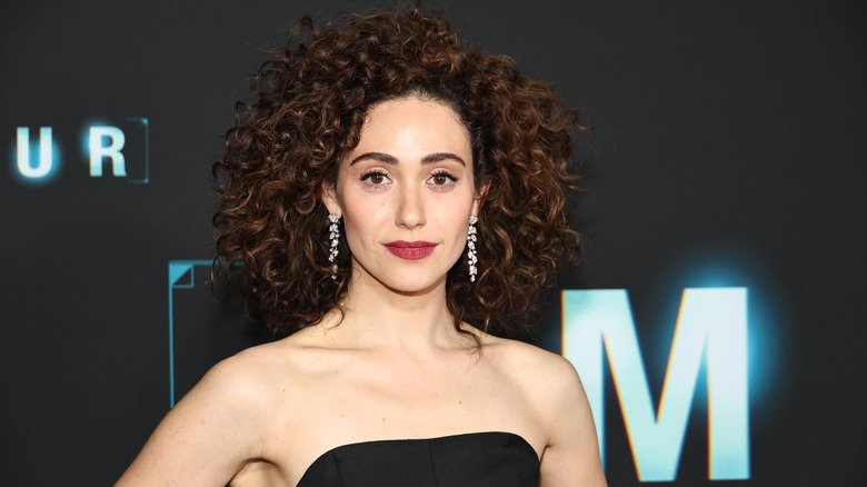 Emmy Rossum smiles on the red carpet in 2025