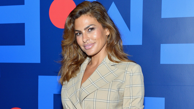 Eva Mendes smiles on the red carpet in 2018