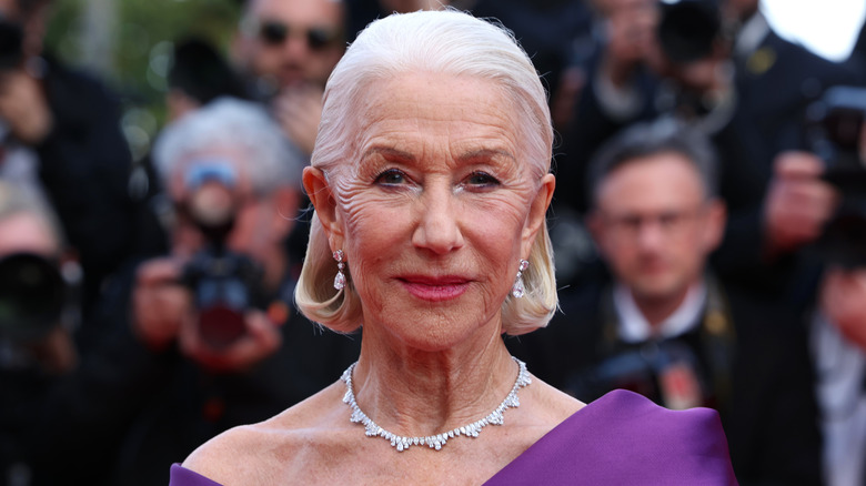 Helen Mirren smiles on the red carpet in 2024