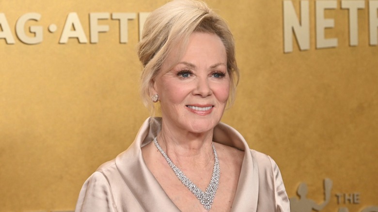 Jean Smart in a champagne color jacket with a diamond necklace