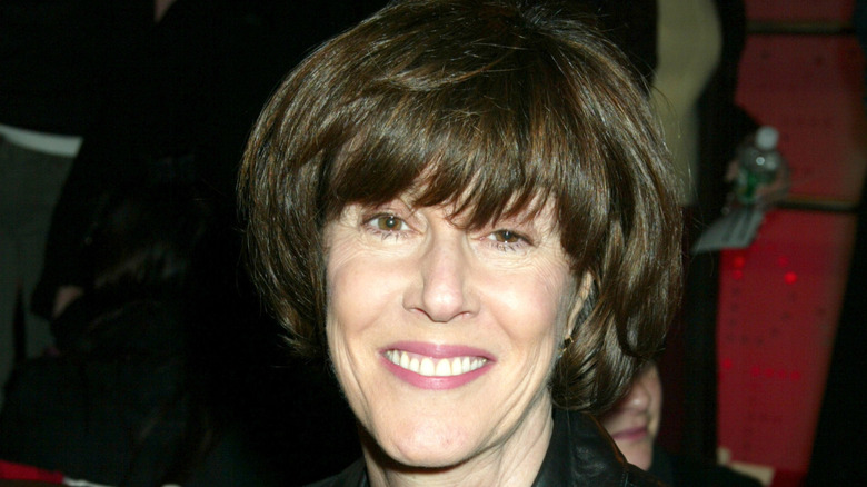 Nora Ephron in a black leather jacket at an event