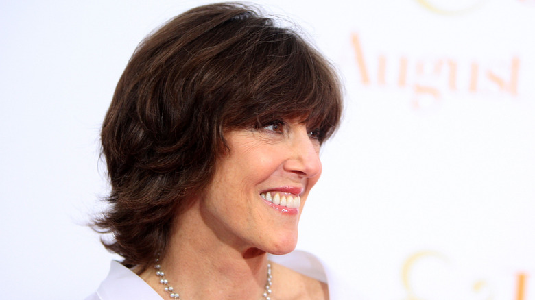 Nora Ephron in a white shirt on the red carpet