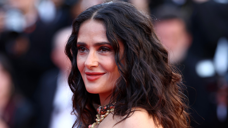Salma Hayek smiles on the red carpet in 2024