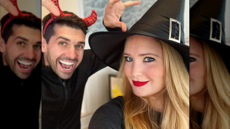 Sarah J. Maas dressed as a witch with her husband dressed as a devil on Instagram