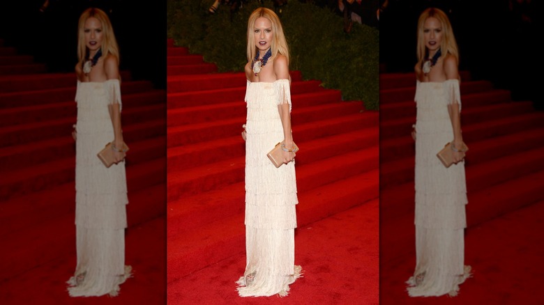 Rachel Zoe wearing long white fringe dress