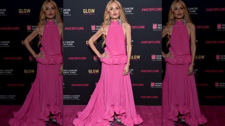 Rachel Zoe in long pink sleeveless dress with ruffles